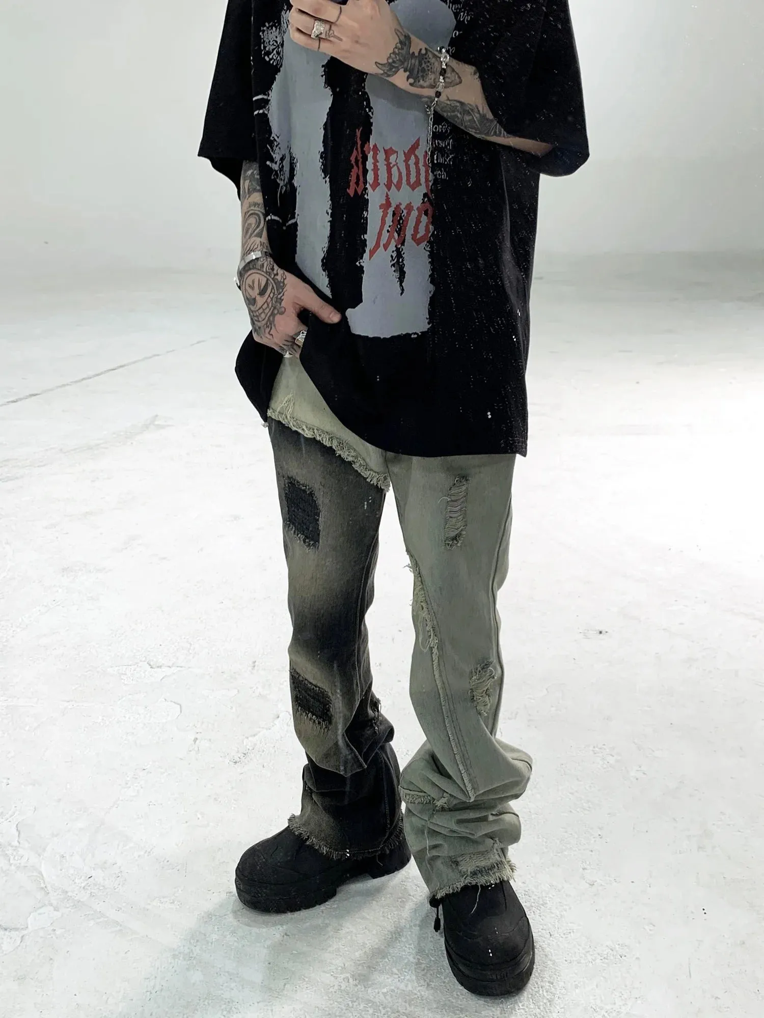 Mens Edgy Tattered Pants with Patched Stitching - Avant-Garde Style